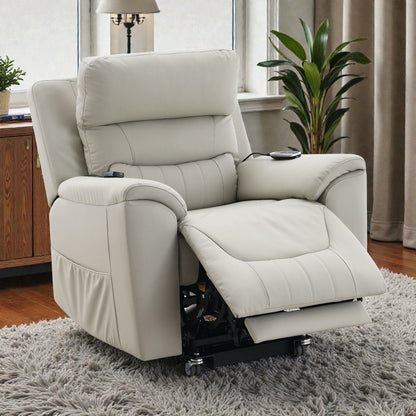 Beige recliner chair in a living room setting with plants and a window.